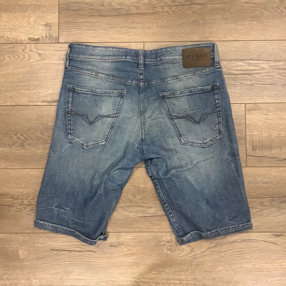 GUESS Lightly Wash Distressed Jean Shorts - Picture 3 of 4